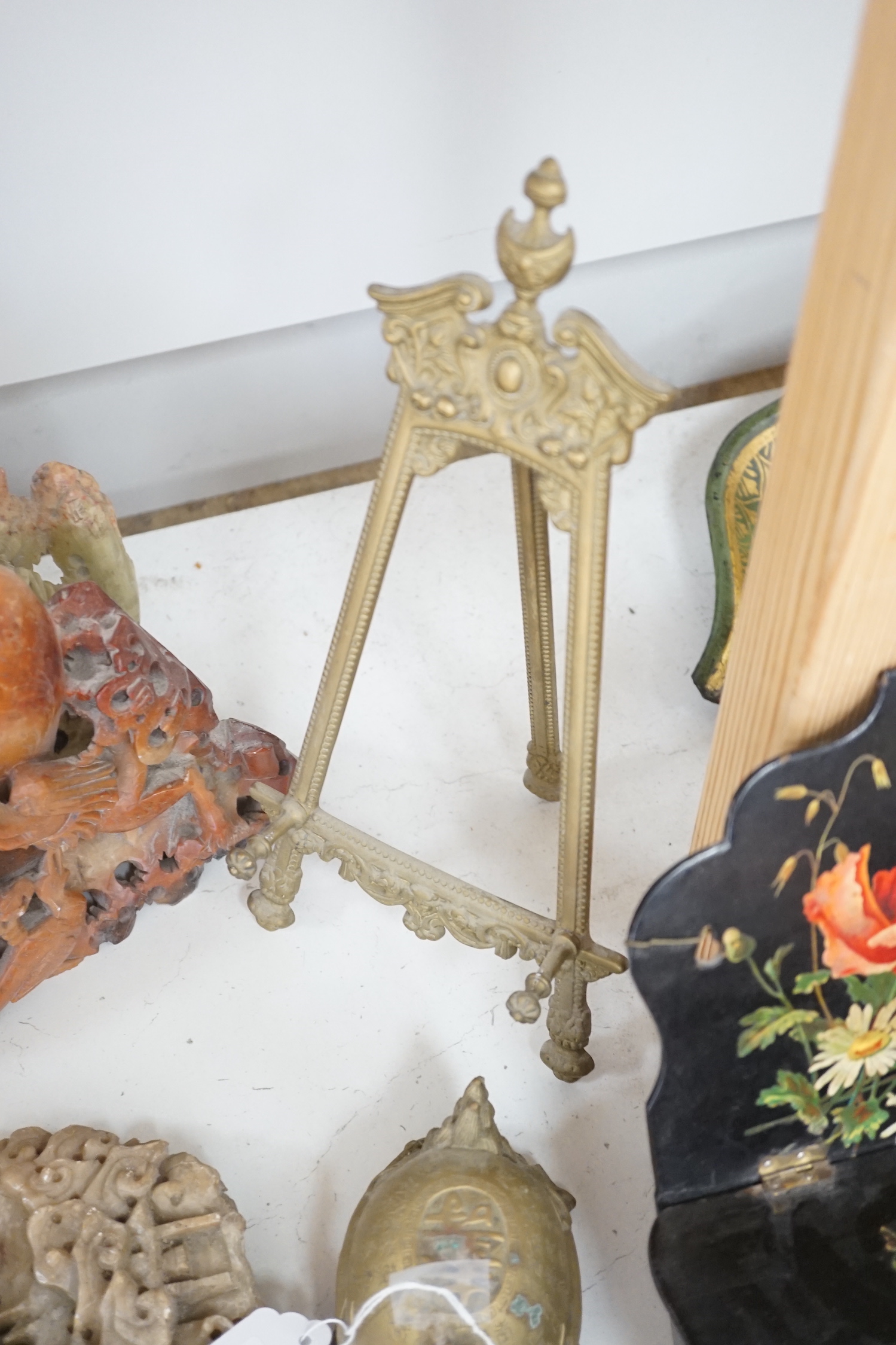 Three Chinese soapstone carvings and a bronze model of a Lónggui, 16cm wide